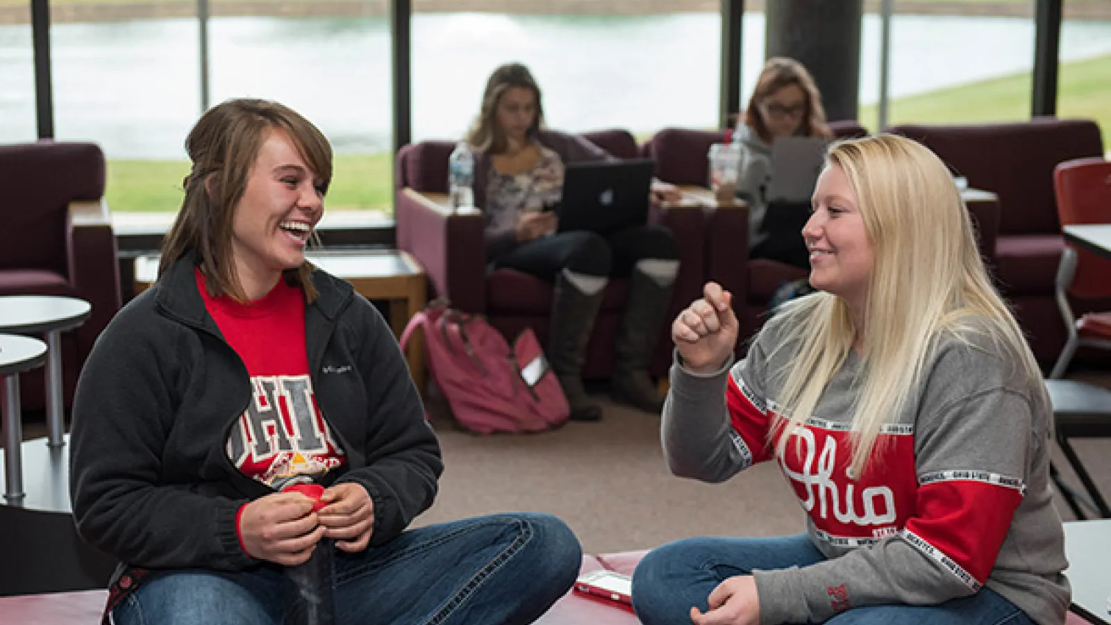 Two students conversing